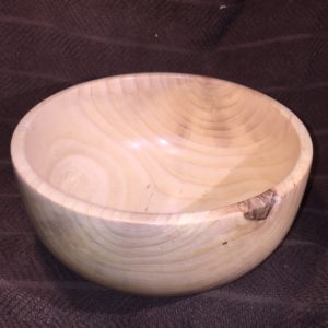 I came across the blank for this bowl in my shop, having forgotten ever roughing it out. Judging by the shape and where I found it in the shop, it must have been from at least 4 years ago. What emerged is an ash bowl, about 8 inches across. Pretty boring bowl, but put it next to the garage door and it would make an acceptable key holder.