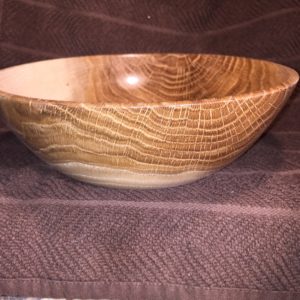 Another bowl from Lisa's white oak tree. Love the coloration in oak trees when they shoot those lines out that go opposite of the growth rings. It looks like cracks in the wood, but it's not.