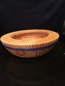 worst piece of wood I've ever tried to turn! The yarn around the rim is a nice touch, though.